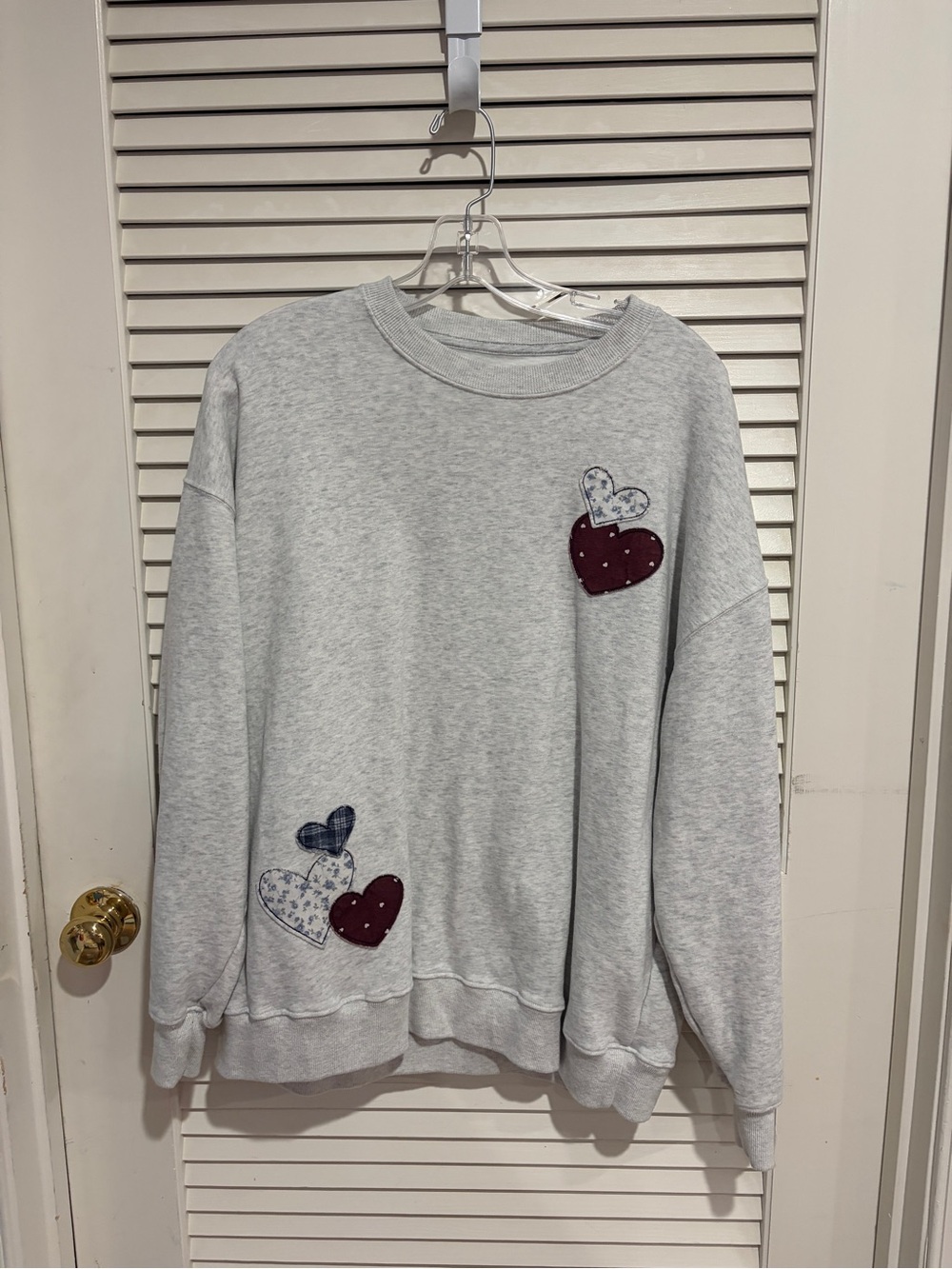 Hollister Light Heather Gray Crewneck Sweatshirt with Heart Appliqués